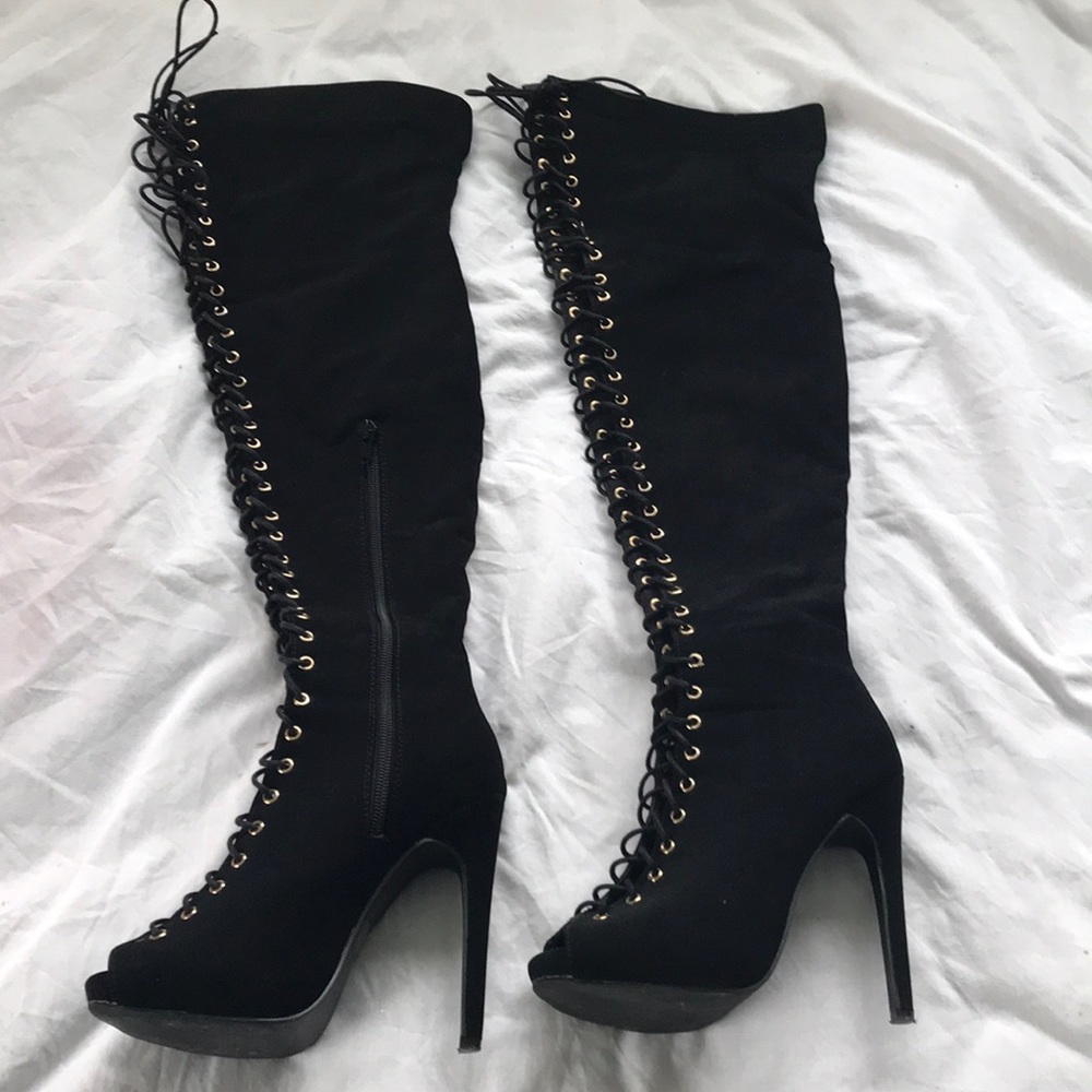 Thigh-high lace up heels